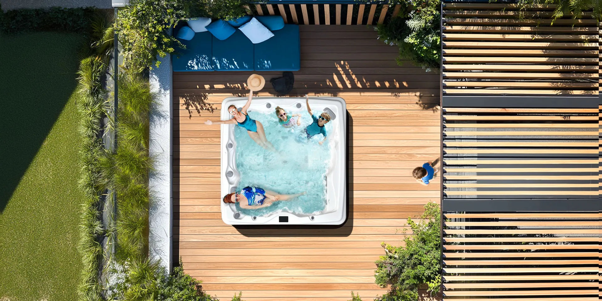 family enjoy the outdoor spa hot tub