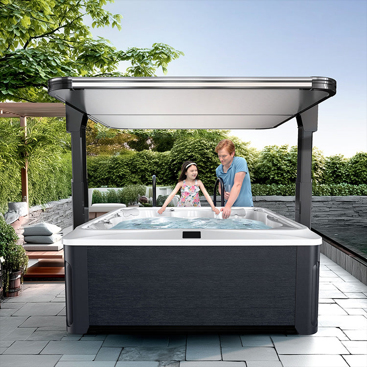 Hot tub with cover in outdoor garden